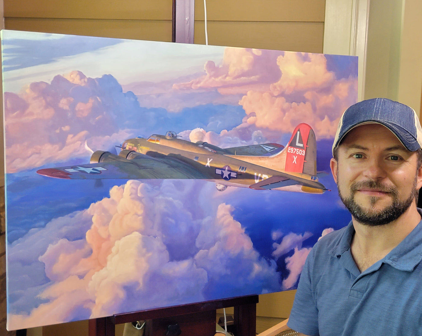 Artist Craig Tinder with his original painting of the B-17 "Twilight's Last Crucible".